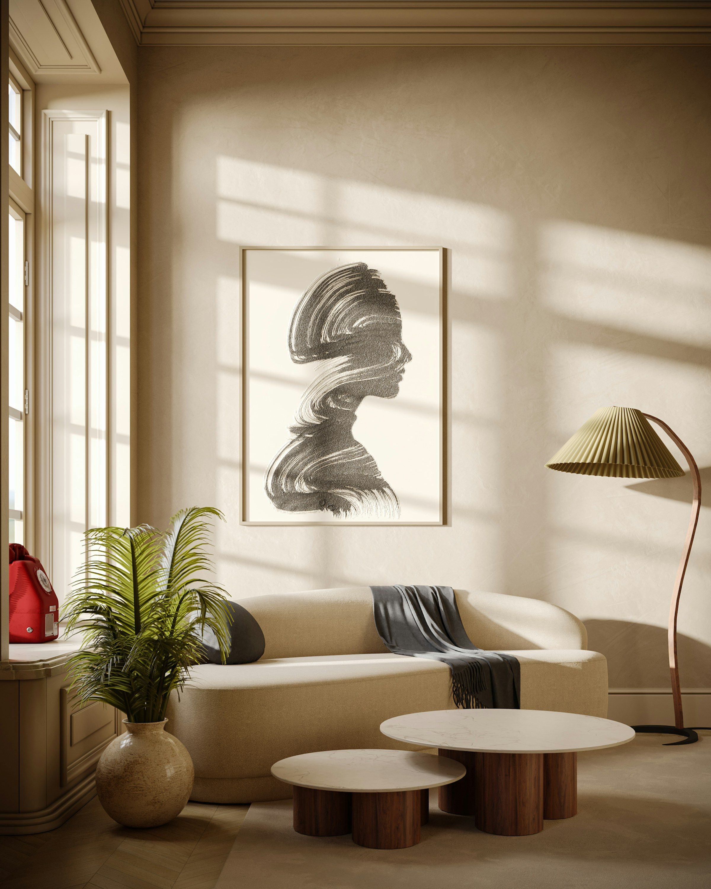 A sunlit living room with a curved cream sofa, low wooden tables and a floor lamp.